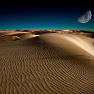 Mesmerizing view of the dunes of Erg Chigaga at night.
